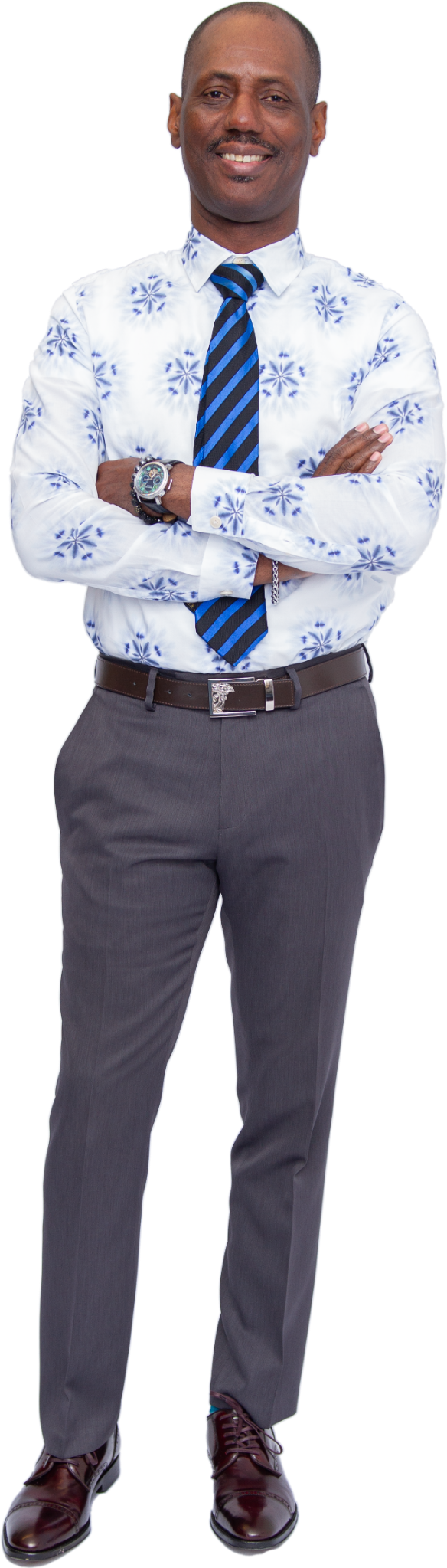 Mr. Jean-Nixon Bertrand full-length portrait in blue patterned shirt and grey pants